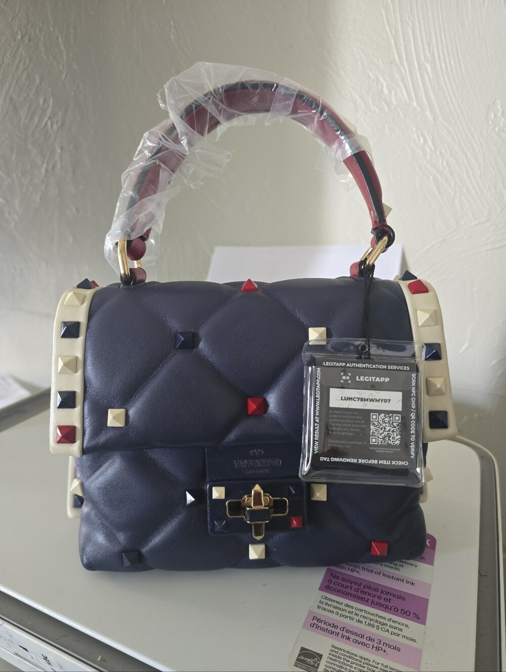 Valentino Garavani Navy Quilted Satchel with Red and Cream Studs